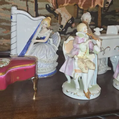 Sale Photo Thumbnail #990: Dresden porcelain musical figurine collection