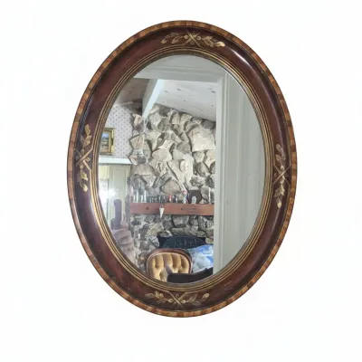 Sale Photo Thumbnail #992: Federal style oval gilt accented wall mirror with miniature portraits