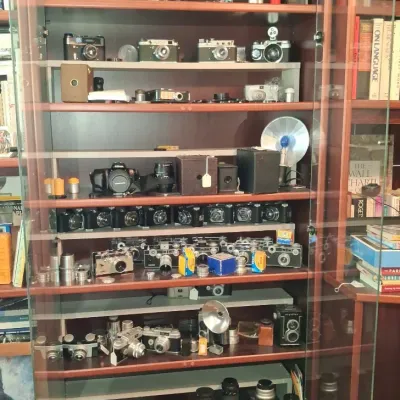 Sale Photo Thumbnail #1007: Vintage camera collection and display case