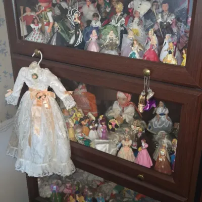Sale Photo Thumbnail #1010: Vintage doll collection with display cabinet b