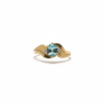 Sale Photo Thumbnail #1037: Vintage k yellow gold blue topaz ring with diamond accents