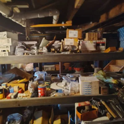 Assorted hardware, tools, and plumbing supplies 