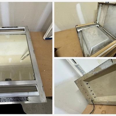Sale Photo Thumbnail #96: Rare vintage transportation lavatory unit from a sleeper car roomette or aircraft washroom. Brushed stainless/aluminum frame with hinged mirror door, two milk-glass light lenses with fluorescent tube, latch, and fold-down interior basin housing. Original 