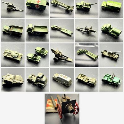 Sale Photo Thumbnail #107: Lot of approximately 21 vintage diecast military vehicles, including:
• Large red-cross military ambulance
• Missile erector with crank
• Two tank transporters with trailers
• 6-wheel recovery wrecker
• Fuel tanker
• Two scout cars
• Half-tr