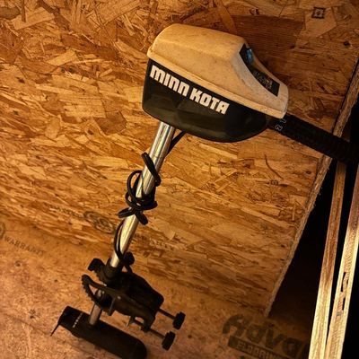 Sale Photo Thumbnail #141: Minn Kota electric trolling motor with transom clamp bracket, telescoping tiller handle, and Weedless prop. Untested. Shows use and storage wear.

Sold as-is, where-is. Local pickup or buyer-arranged 3rd-party pickup only.
Disclosure: Descriptions develop