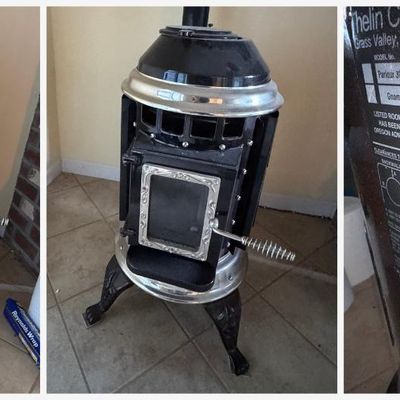 Sale Photo Thumbnail #154: Thelin Co. (Grass Valley, CA) "Gnome" pellet-burning room heater in classic Victorian pot-belly styling. Rated 27,000 BTU max input; manufactured 2007, Serial No. 8240. Black enamel body with polished nickel top and bottom rings, decorative scrollwork doo
