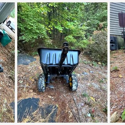 Sale Photo Thumbnail #170: Heavy-duty tow-behind utility dump cart with a black poly tub, steel frame, and tongue with pin hitch for lawn tractors, riding mowers, or ATVs. Pneumatic turf tires on yellow rims. Tilting tub for easy dumping of mulch, leaves, firewood, soil, and yard d
