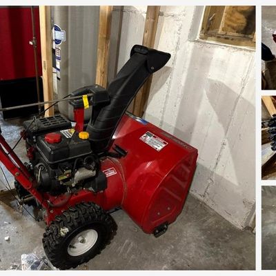 Sale Photo Thumbnail #172: Troy-Bilt Storm 2620 two-stage gas snow blower, Model 31BM53P3711, with a 26" clearing width. Features electric start, rotating chute with deflector, aggressive X-Trac-style snow tires, serrated auger, and dash panel with drive and auger controls. Include