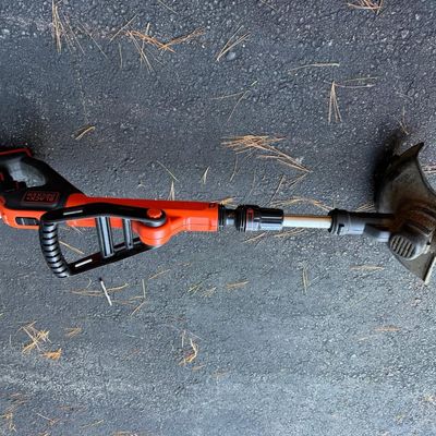 Sale Photo Thumbnail #175: Black+Decker cordless string trimmer with edging wheel, adjustable handle, and telescoping shaft. Untested. Shows yard use.

Sold as-is, where-is. Local pickup or buyer-arranged 3rd-party pickup only.
Disclosure: Descriptions developed with the help of AI