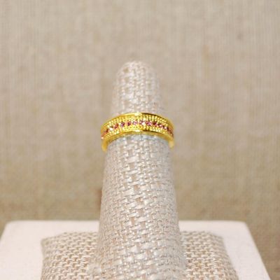 Size 6½ Half Infinity Ring with Single Row of Pink Stones on a Gold Tone Band (3.2g)