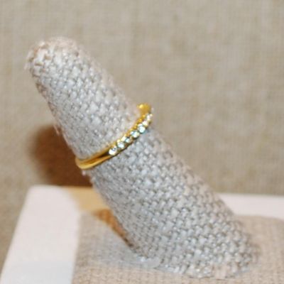Size 6¾ Semi Infinity Ring with 15 Round Clear Stones on a Gold Tone Band (1.6g)