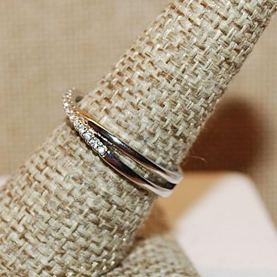 Size 8 Half Infinity Criss-Cross Ring with 2 Rows of Small Stone Accents on a Silver Tone Band (2.4g)