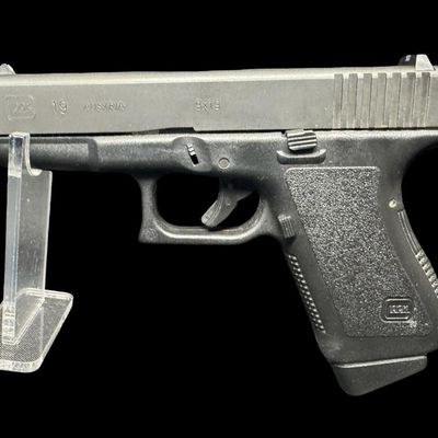 Sale Photo Thumbnail #3: This pistol is chambered in 9x19mm. It includes the original box, two standard magazines, one extended magazine, and a speed loader. This is a super clean pistol. Serial number AMT641 US. Not tested. Pre-auction estimate: $400-$600. [RS]