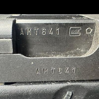 Sale Photo Thumbnail #7: This pistol is chambered in 9x19mm. It includes the original box, two standard magazines, one extended magazine, and a speed loader. This is a super clean pistol. Serial number AMT641 US. Not tested. Pre-auction estimate: $400-$600. [RS]