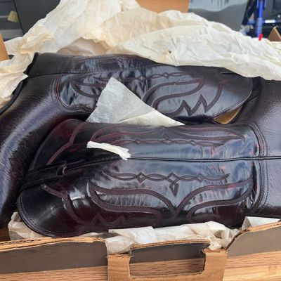 Sale Photo Thumbnail #29: A pair of vintage Nocona men's western cowboy boots crafted in dark polished leather with detailed shaft stitching. Includes the original Nocona Boots graphic box with original tissue paper lining. Boots appear to be in good vintage condition with minor s