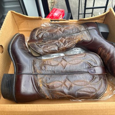 Sale Photo Thumbnail #31: Pair of vintage Long Haul brown leather western cowboy boots featuring stitched patterns along the shafts. Made in USA. Comes in the original Long Haul cardboard shoe box marked '11-6-89'. Shows noticeable age-related wear including surface cracking, peel
