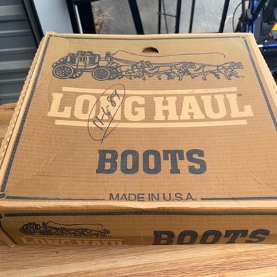 Sale Photo Thumbnail #30: Pair of vintage Long Haul brown leather western cowboy boots featuring stitched patterns along the shafts. Made in USA. Comes in the original Long Haul cardboard shoe box marked '11-6-89'. Shows noticeable age-related wear including surface cracking, peel