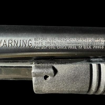Sale Photo Thumbnail #61: This gun features a chamber size of three inches. It has a lightweight anodized aluminum alloy receiver. It shares high-parts interchangeably with the standard Mossberg 500 series. The barrel length is 18.5 inches. The overall length is 29 inches. Serial 