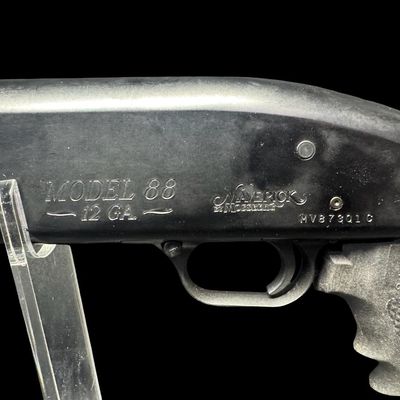 Sale Photo Thumbnail #57: This gun features a chamber size of three inches. It has a lightweight anodized aluminum alloy receiver. It shares high-parts interchangeably with the standard Mossberg 500 series. The barrel length is 18.5 inches. The overall length is 29 inches. Serial 