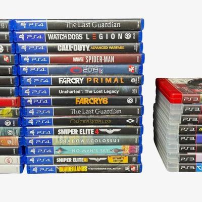 Sale Photo Thumbnail #76: Includes a PlayStation 4 Uncharted 4 Limited Edition console in blue, featuring a silkscreened silhouette of Nathan Drake, with matching controller; a PlayStation 3 console; two black controllers; a Seagate Game Drive portable external hard drive; and 38 