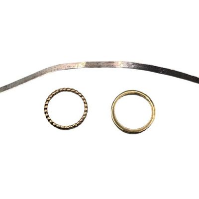 Sale Photo Thumbnail #80: Includes two rings with a gold vermeil wash, and a herringbone bracelet. The bracelet has a kink. Length of bracelet: 7”. Rings are size 7.25. The total weight is 7.64 grams. [VY]