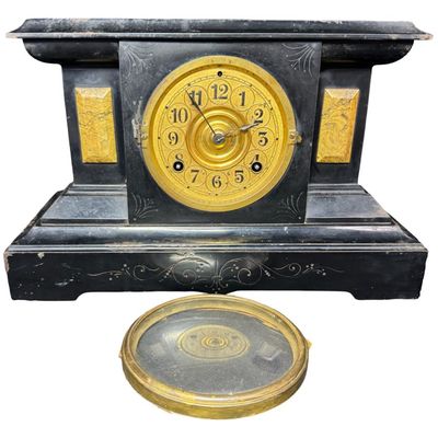 Sale Photo Thumbnail #116: This has a classic American eight-day mechanical movement. The glass face needs to be re-attached at the hinges. It may or may not have been re-painted. Not tested. Measurement: 15.5”W x 10”H. [VY]