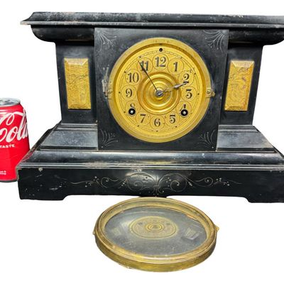 Sale Photo Thumbnail #117: This has a classic American eight-day mechanical movement. The glass face needs to be re-attached at the hinges. It may or may not have been re-painted. Not tested. Measurement: 15.5”W x 10”H. [VY]