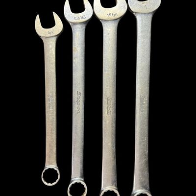 Sale Photo Thumbnail #134: Includes an OEX32 (1”), an OEX30 (15/16”), an OEX26A (13/16”), and an OEX24 (3/4”). These are 12-point open-end/box-end combination wrenches, and feature Snap-On’s Flank Drive System. Total of four pieces. Pre-auction estimate: $75-$100. [CS]