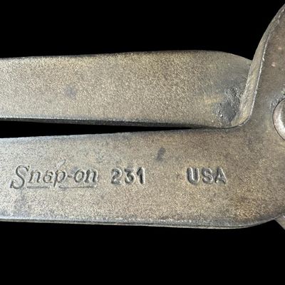 Sale Photo Thumbnail #144: Includes Snap-On 231, designed for removing and installing drum brake springs on trucks; and Snap-On 131A, designed for removing and installing drum brake springs on passenger vehicles. Total of two pieces. Pre-auction estimate: $75-$125. [CS]