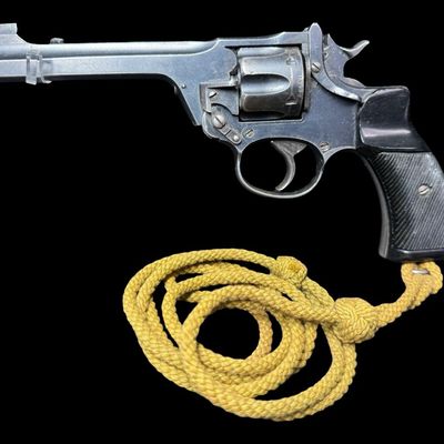 Sale Photo Thumbnail #167: The Enfield No. 2 is a British top break double action revolver using the .38 S&W round manufactured from 1930 to 1957. It was the standard British/Empire sidearm in the Second World War. It holds six rounds, has Bakelite grips, and has a five inch barrel