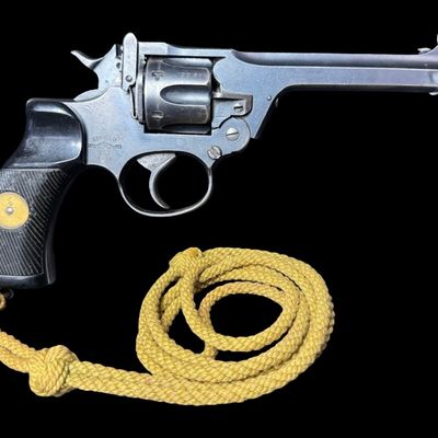 Sale Photo Thumbnail #164: The Enfield No. 2 is a British top break double action revolver using the .38 S&W round manufactured from 1930 to 1957. It was the standard British/Empire sidearm in the Second World War. It holds six rounds, has Bakelite grips, and has a five inch barrel