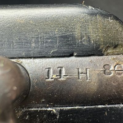 Sale Photo Thumbnail #170: The Enfield No. 2 is a British top break double action revolver using the .38 S&W round manufactured from 1930 to 1957. It was the standard British/Empire sidearm in the Second World War. It holds six rounds, has Bakelite grips, and has a five inch barrel