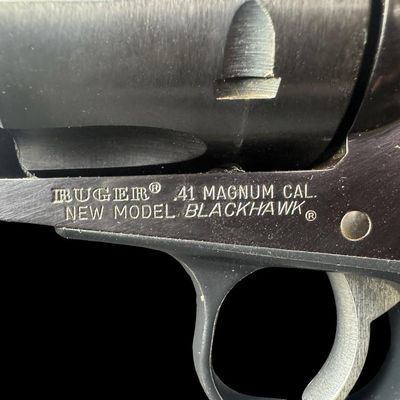 Sale Photo Thumbnail #177: This Single Six fires the Remington caliber .41 magnum. It has a six round capacity. It has a fully windage and elevation rear sight. It is made from alloy steel with a blued finish, and has polymer grips. The barrel length is 4.62 inches. Also included i