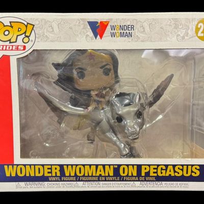 Sale Photo Thumbnail #193: This piece features Wonder Woman on a Pegasus.  It is in the original unopened box. Measurement of box: 10” x 7” x 8”. [RS]