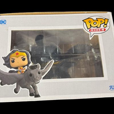 Sale Photo Thumbnail #194: This piece features Wonder Woman on a Pegasus.  It is in the original unopened box. Measurement of box: 10” x 7” x 8”. [RS]