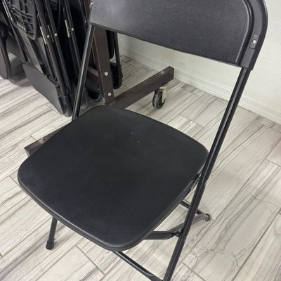 Sale Photo Thumbnail #242: Includes 40 folding chairs on a rolling storage rack. The rack measures 6’ high, by 5’ wide. [RS]