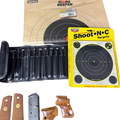 Sale Photo Thumbnail #259: Includes a bore sighter, cleaning kits, wood grips (including Colt), 12-gauge ammo, and .38 target ammo. The ammunition is not complete boxes. NO SHIPPING ON AMMUNITION. [RS]