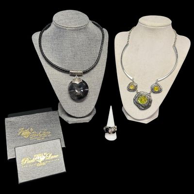 Sale Photo Thumbnail #264: Includes an abalone inlay necklace, a smoky quartz style amulet, and an onyx and rhinestone ring. Total of three pieces. [RS]