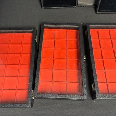 Sale Photo Thumbnail #301: Some of these displays are hinged, and the others have filled covers. Some are fiberfill or velvet lined. Total of 12 pieces.