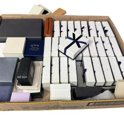 Sale Photo Thumbnail #308: Includes over 100 jewelry boxes. Some are vintage. There are cardboard, plastic, and covered metal boxes. [RS]
