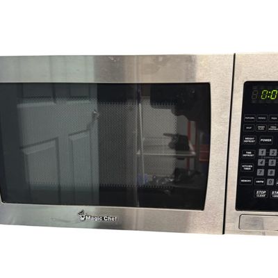 Sale Photo Thumbnail #344: Includes a Frigidaire refrigerator and a Magic Chef microwave. Both are working at the time of catalog. Measurement of refrigerator: 33”H x 18.5”W x 17”D. [RS]