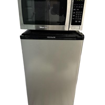 Sale Photo Thumbnail #342: Includes a Frigidaire refrigerator and a Magic Chef microwave. Both are working at the time of catalog. Measurement of refrigerator: 33”H x 18.5”W x 17”D. [RS]