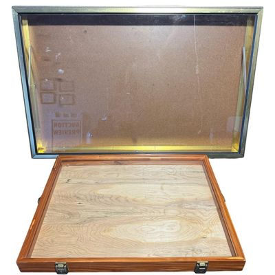 Sale Photo Thumbnail #365: Includes one box with hinges, and no lock. Also includes a brass-tone metal display that is missing the key. Measurement of brass-tone box: 34” x 22.5”. [RS]