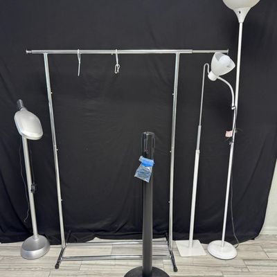 Sale Photo Thumbnail #393: Includes one retract-o-belt, two floor lamps, and a collapsible clothes rack. Total of five pieces. [RS]