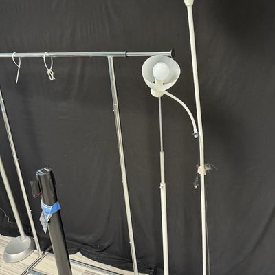 Sale Photo Thumbnail #395: Includes one retract-o-belt, two floor lamps, and a collapsible clothes rack. Total of five pieces. [RS]
