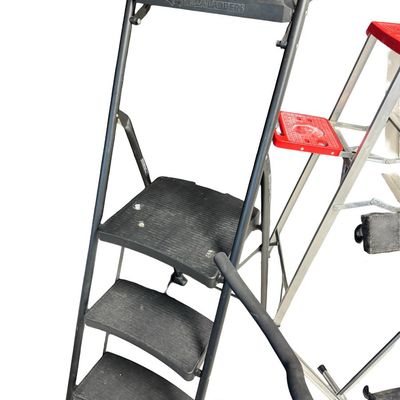 Sale Photo Thumbnail #399: Includes a Gorilla ladder with platform, a Louisville aluminum ladder, a furniture dolly, and a boat display stand. Total of four pieces. [RS]