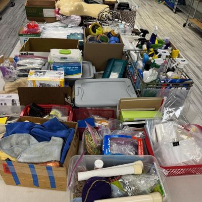 Sale Photo Thumbnail #400: Includes jewelry props, jewelry bags, jewelry boxes, and other jewelry supplies. Also includes storage, electrical cords, multi-plugs, binders, folders, light bulbs, a 1920s miniature metal airplane hangar, first aid supplies, glycine bags, and so much mo