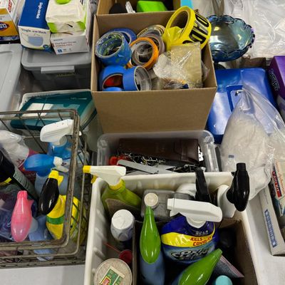 Sale Photo Thumbnail #409: Includes jewelry props, jewelry bags, jewelry boxes, and other jewelry supplies. Also includes storage, electrical cords, multi-plugs, binders, folders, light bulbs, a 1920s miniature metal airplane hangar, first aid supplies, glycine bags, and so much mo