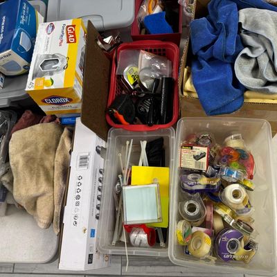 Sale Photo Thumbnail #401: Includes jewelry props, jewelry bags, jewelry boxes, and other jewelry supplies. Also includes storage, electrical cords, multi-plugs, binders, folders, light bulbs, a 1920s miniature metal airplane hangar, first aid supplies, glycine bags, and so much mo