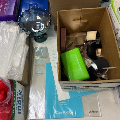 Sale Photo Thumbnail #402: Includes jewelry props, jewelry bags, jewelry boxes, and other jewelry supplies. Also includes storage, electrical cords, multi-plugs, binders, folders, light bulbs, a 1920s miniature metal airplane hangar, first aid supplies, glycine bags, and so much mo